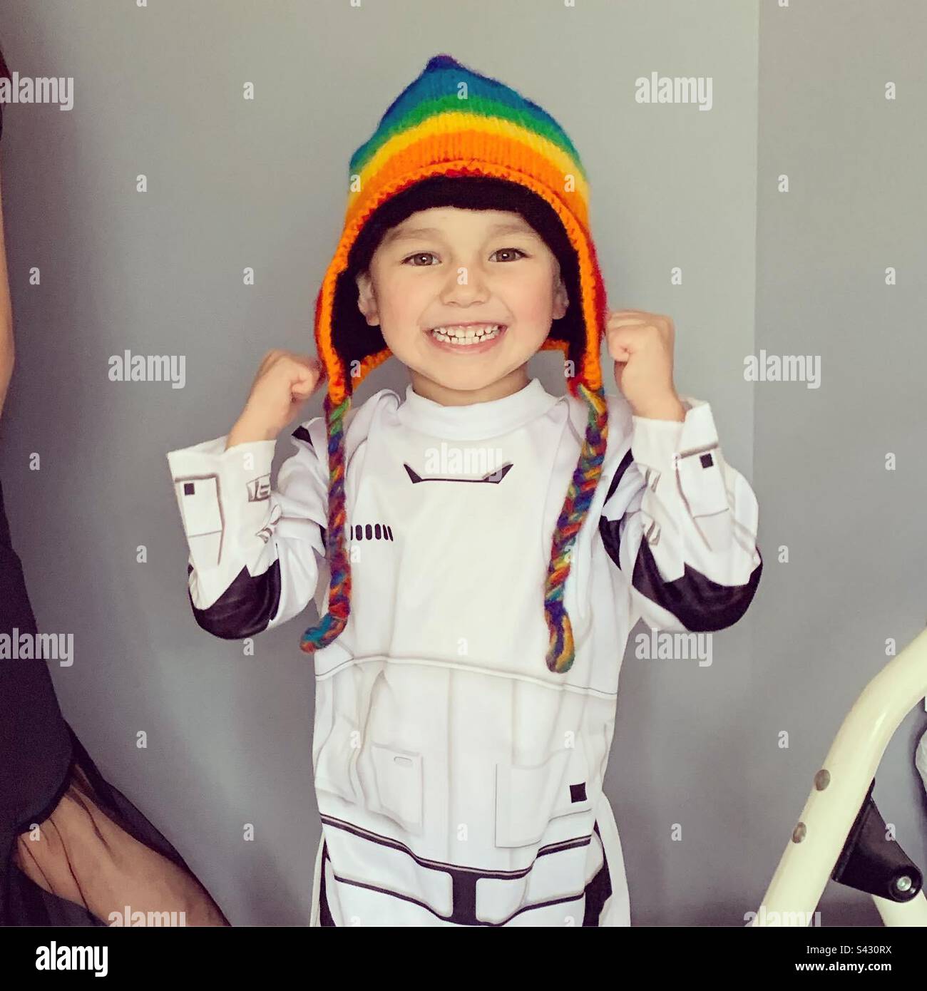 Boy in rainbow hat Stock Photo - Alamy