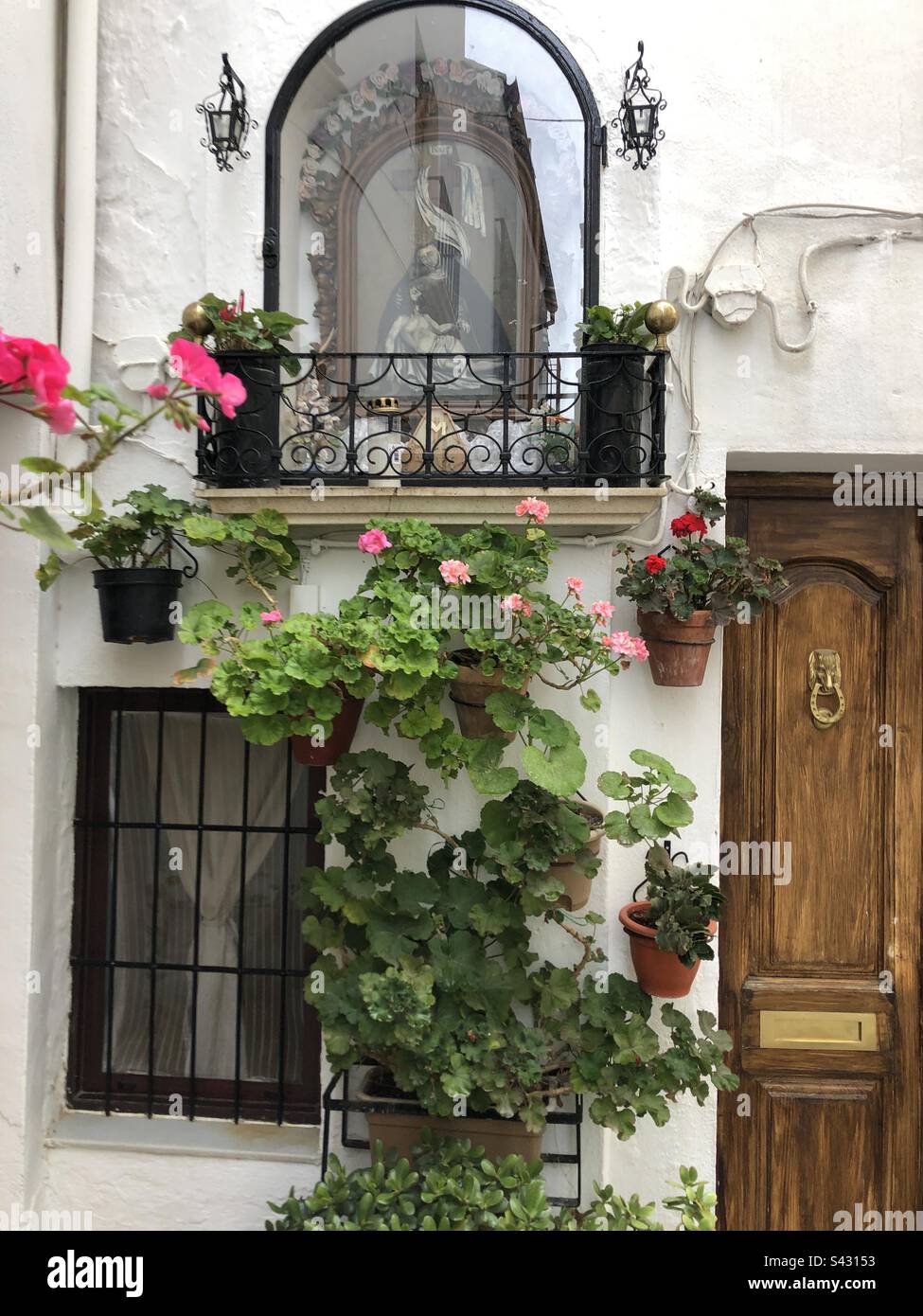 Beautiful Floral decorations outside and Andalusian house in Priego de Cordoba  Spain - Smartphone Captured Stock Image