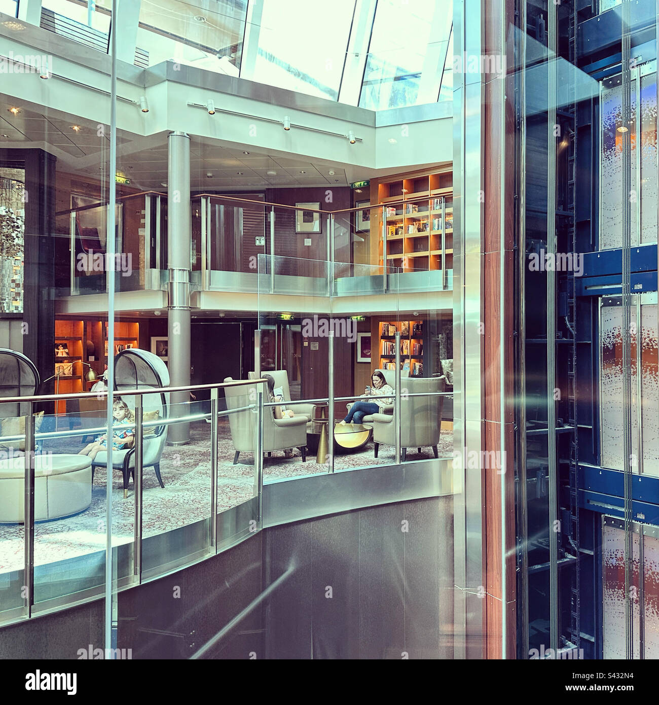 Library and atrium, Celebrity Silhouette, at PortMiami prior to a Western Caribbean cruise - Smartphone Captured Stock Image