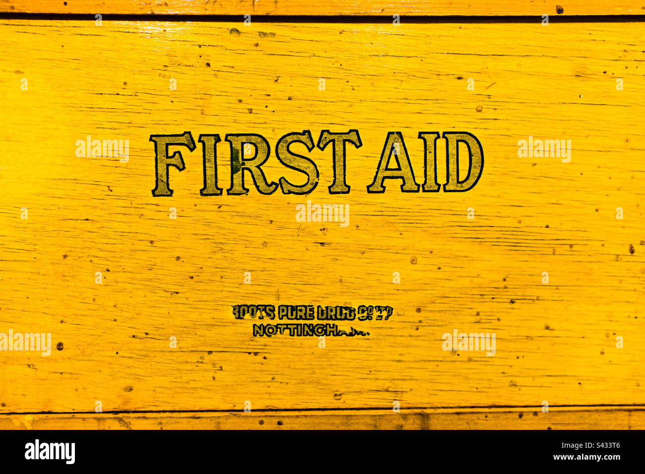 A close up of an old First Aid box from the 70’s on a wall in a home in the UK - Smartphone Captured Stock Image