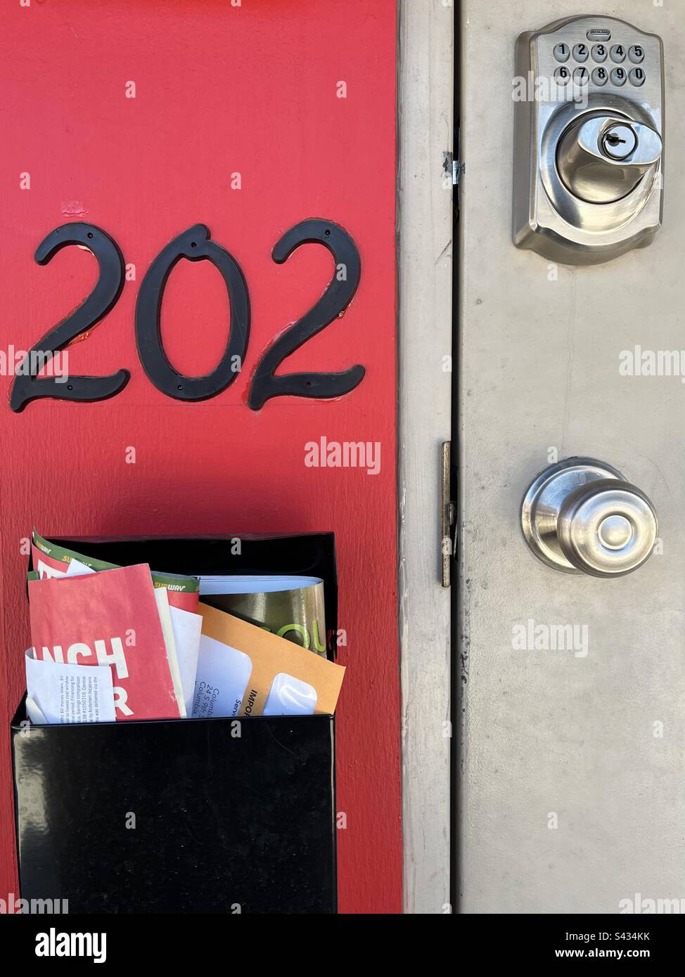 Red porch. House number 202. Includes print space. - Smartphone Captured Stock Image