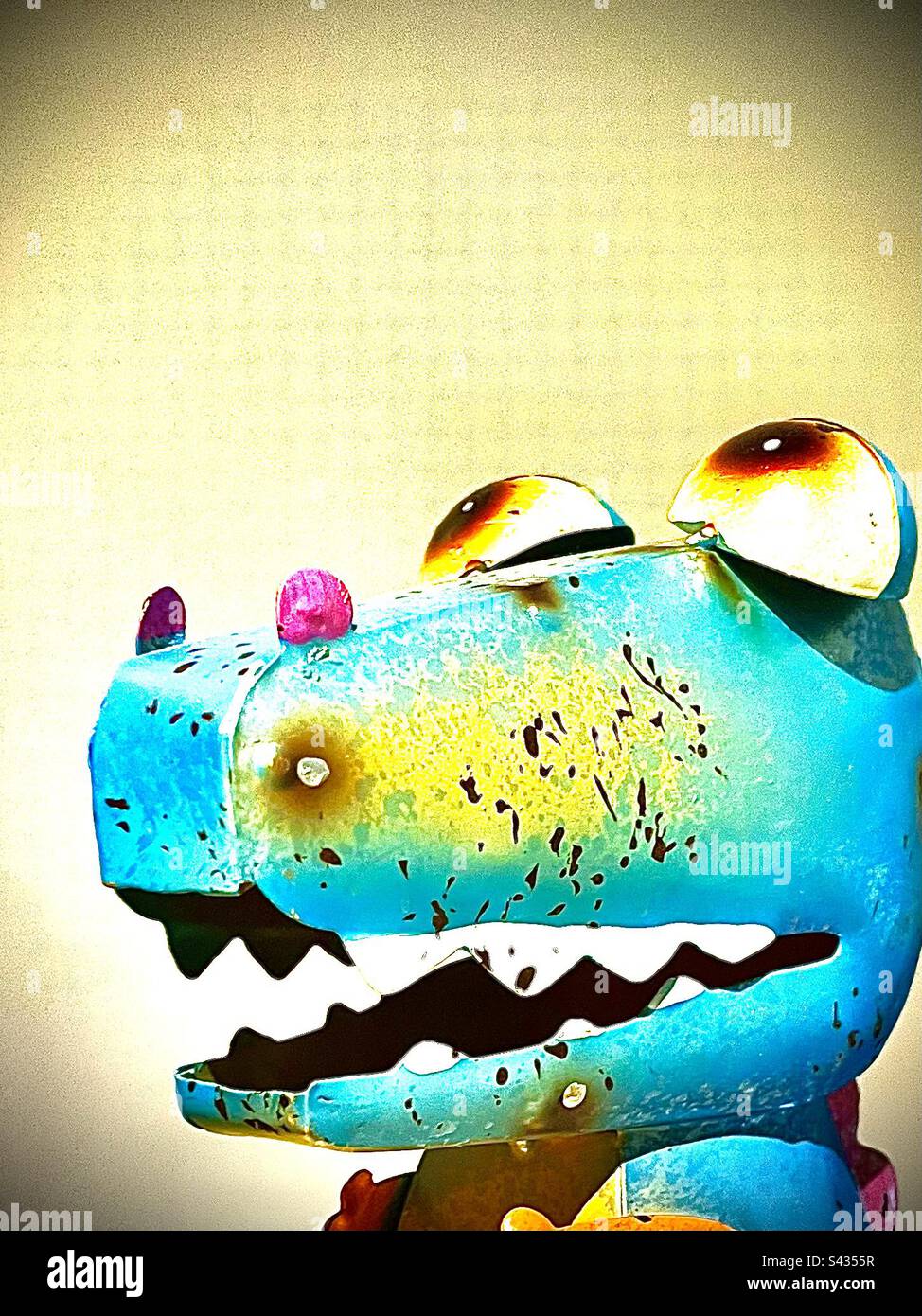 Upcycled metal dinosaur sculpture. Includes print space. - Smartphone Captured Stock Image