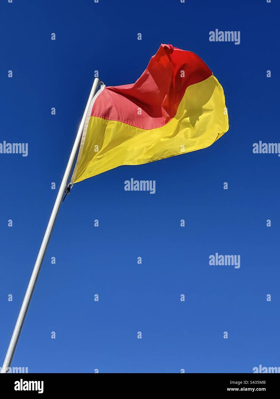 Lifeguard safety flag on the Atlantic coast - Smartphone Captured Stock Image