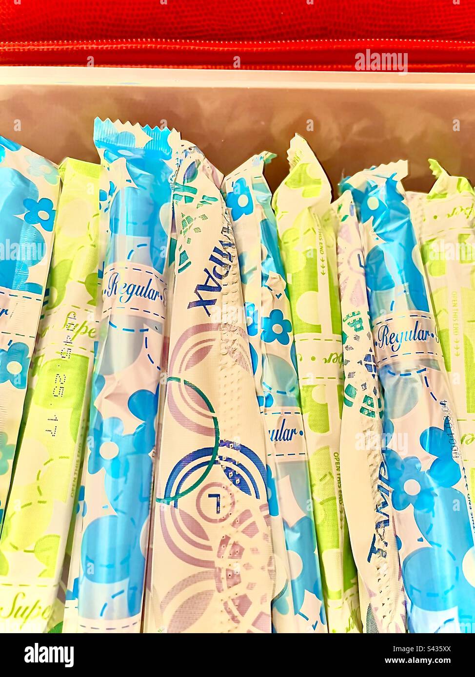 Tampons. Tampax and other brands in various sizes. Includes print space