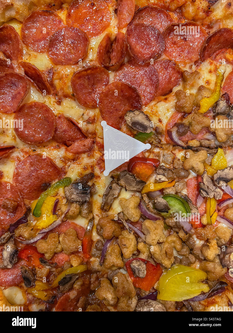Pizza Hut half and half pizza Stock Photo Alamy