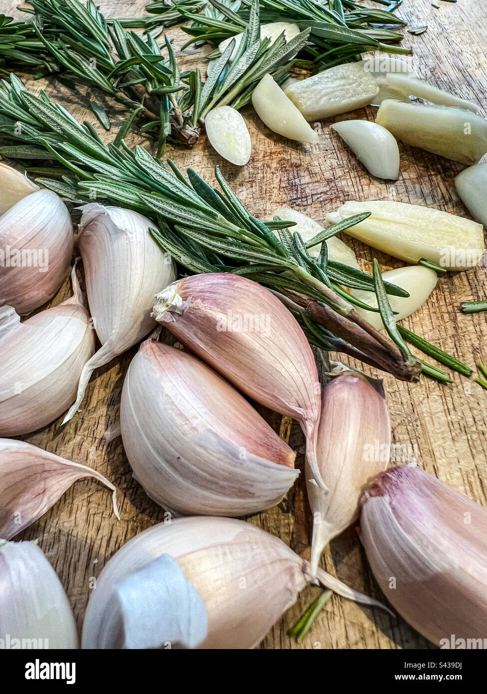 Garlic cloves and rosemary herbs - Smartphone Captured Stock Image