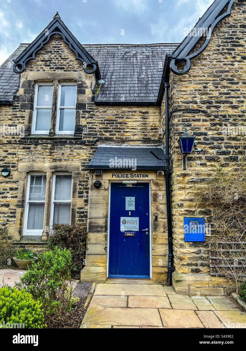West Yorkshire police small Ilkley police station with blue door - Smartphone Captured Stock Image