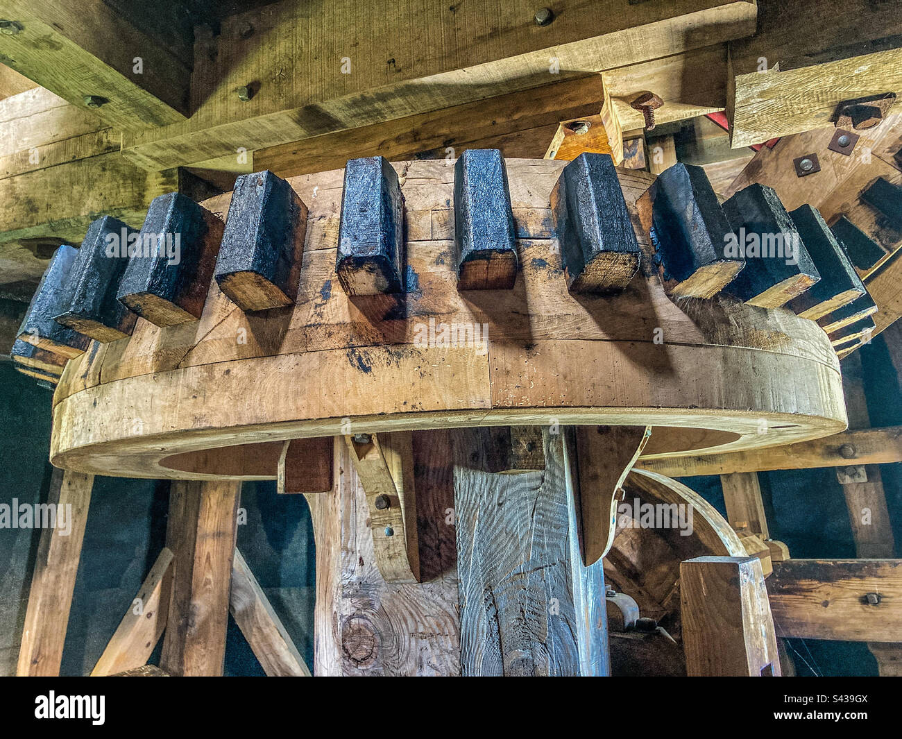 Giant Wooden Cog inside Ripple Windmill, Ringwould, Kent Stock Photo