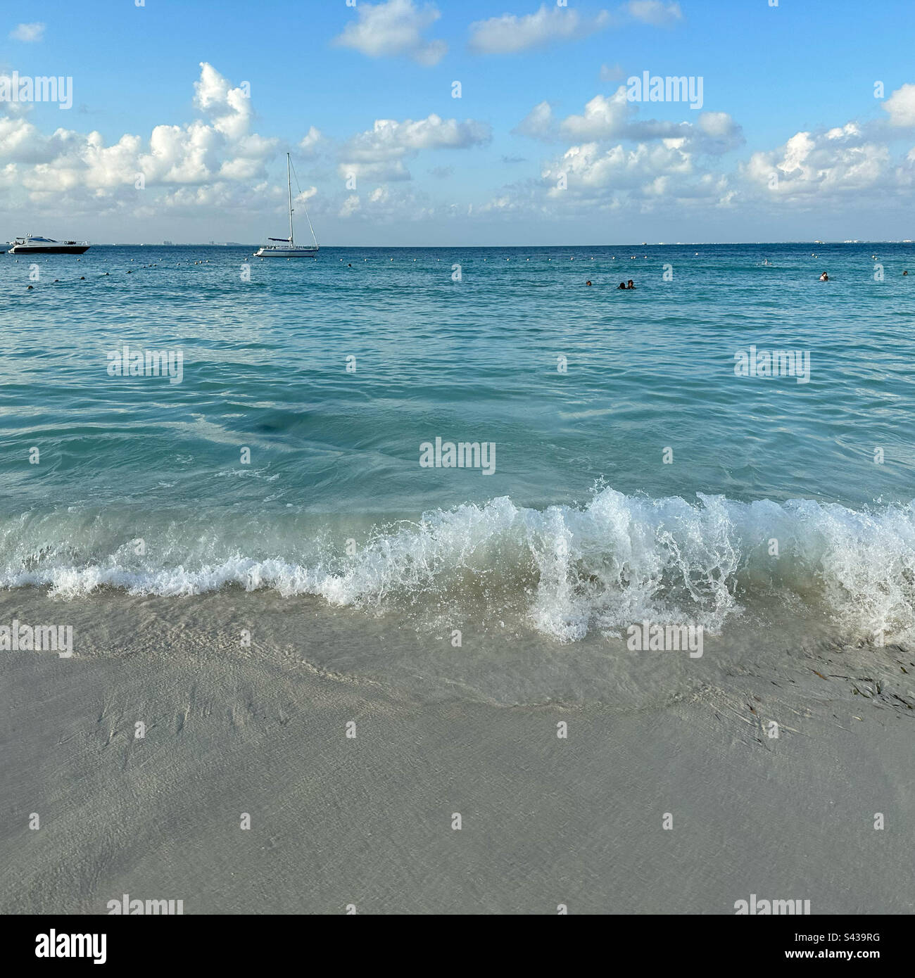 A wave crashing on the beach, Hotel Zone, Cancun, Quintana Roo, Yucatan Peninsula, Mexico - Smartphone Captured Stock Image