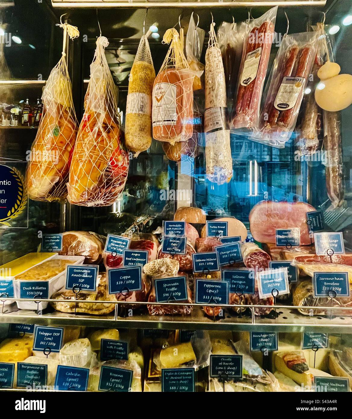 Italian cured meats displayed in at the Pantry Centrale shop in Sai Ying Pun, Hong Kong. - Smartphone Captured Stock Image