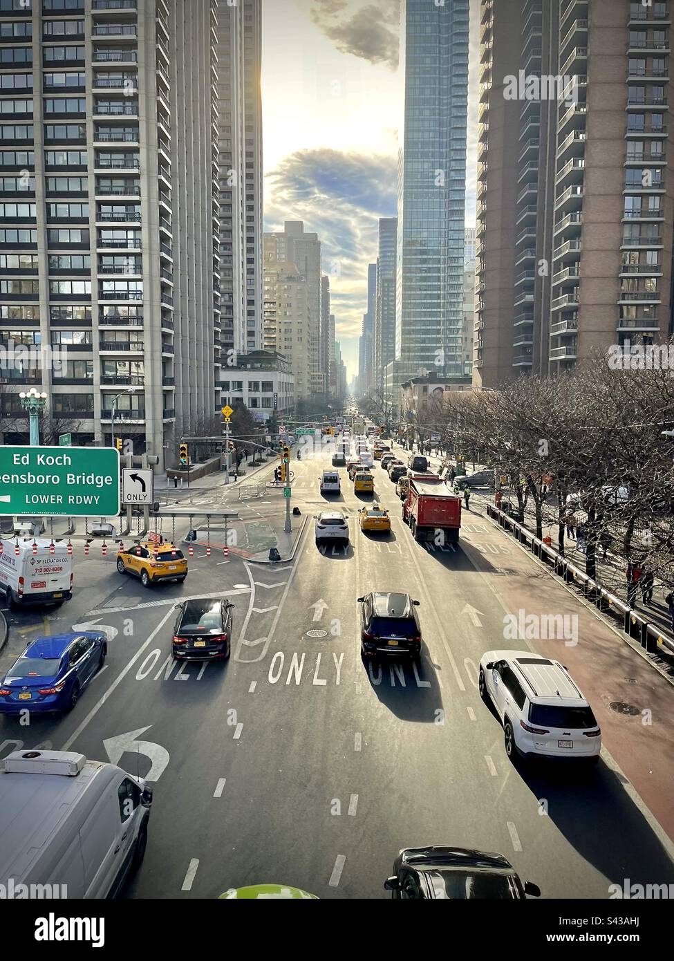 Aerial view of a Manhattan street with traffic and buildings. Photo ...
