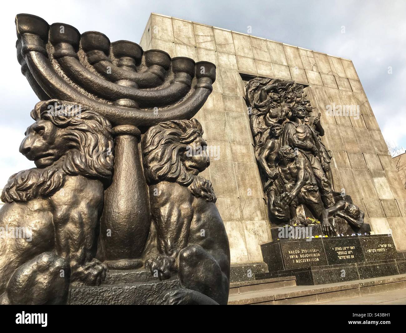 Warsaw Poland the monument to the Ghetto Uprising by Jewish resistance fighters in 1943 against the Nazi Germans. Stock Photo