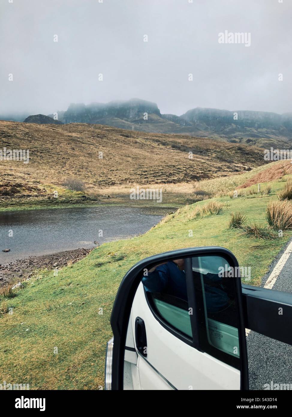 A view out of the window of a campervan at Lochan nan Dunan on the North Dunans Road A855, Dunans, Isle of Skye Scotland - Smartphone Captured Stock Image