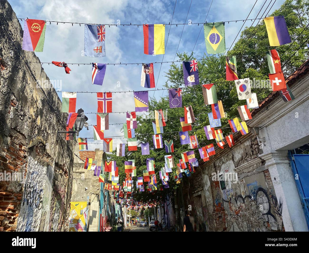 Getsemani Cartagena Colombia colourful street with flags - Smartphone Captured Stock Image