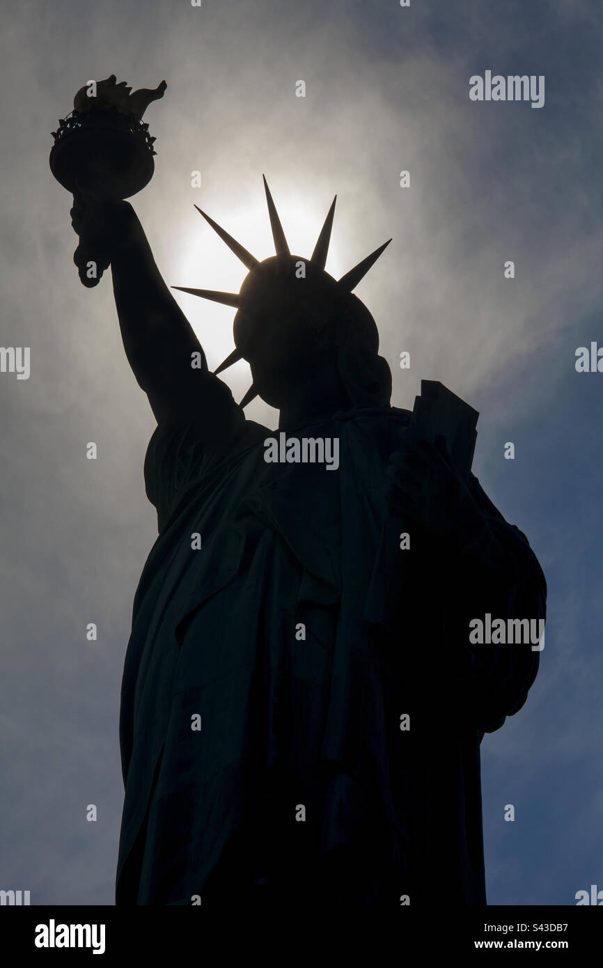 Silhouette of Statue of Liberty Stock Photo