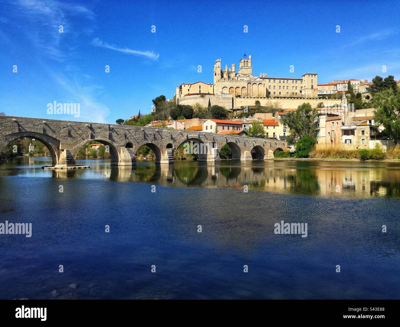 The Old Bridge and the St Nazaire Cathedral in Beziers. Occitania, France - Smartphone Captured Stock Image