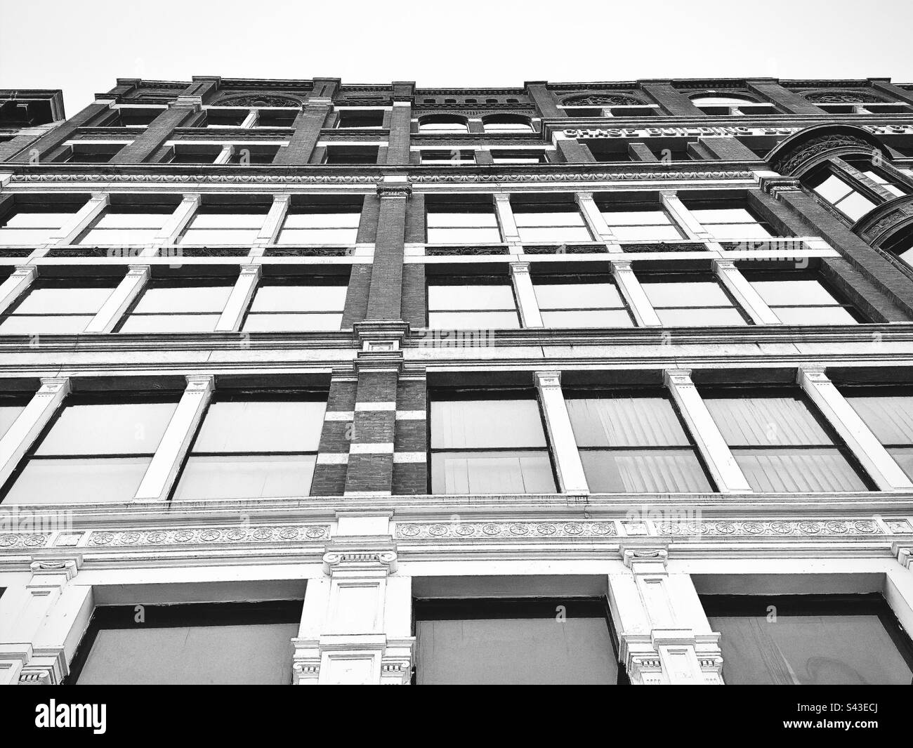 Chase building. Old, ornate architecture in downtown area of Worcester, Massachusetts, USA. Black and white. Windows, brick, and columns. - Smartphone Captured Stock Image