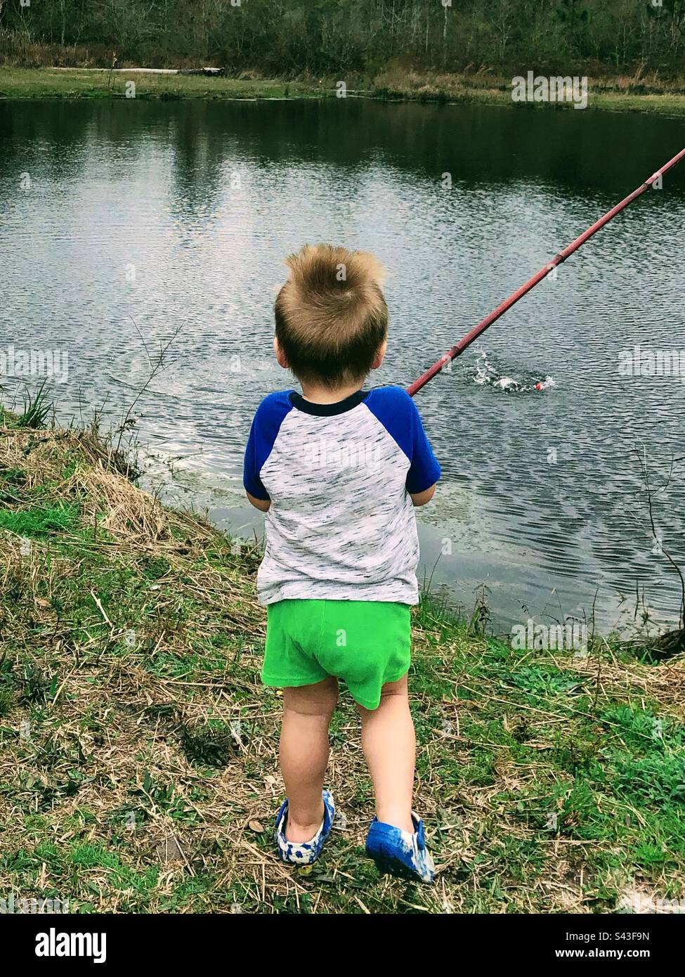 Cane pole fishing hi-res stock photography and images - Alamy