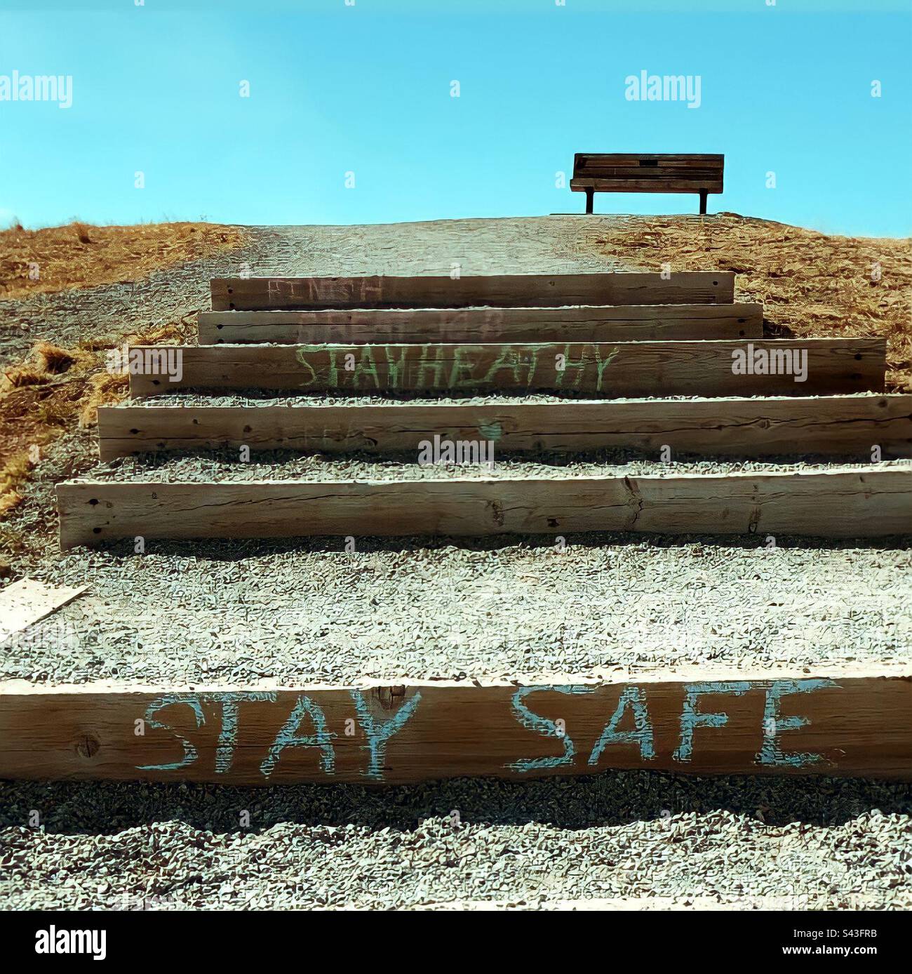 Coulee Hike During the Covid Pandemic in 2020 - words of encouragement being shared along the path.  Alone but together. - Smartphone Captured Stock Image