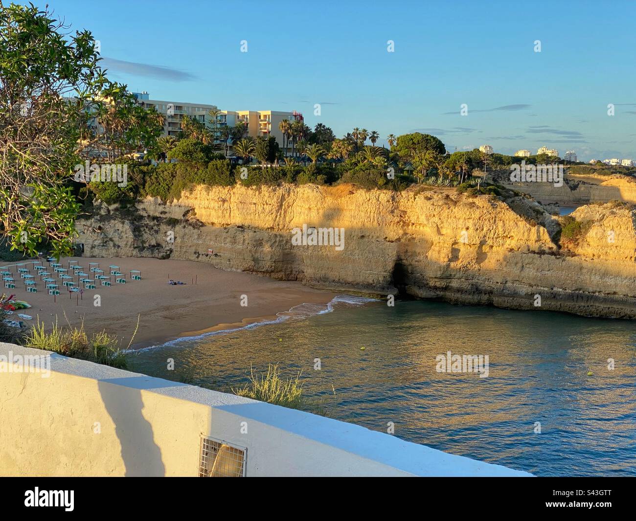 Sunset view at Senhora da Rocha beach with sandstone rocks in Algarve, Portugal. - Smartphone Captured Stock Image