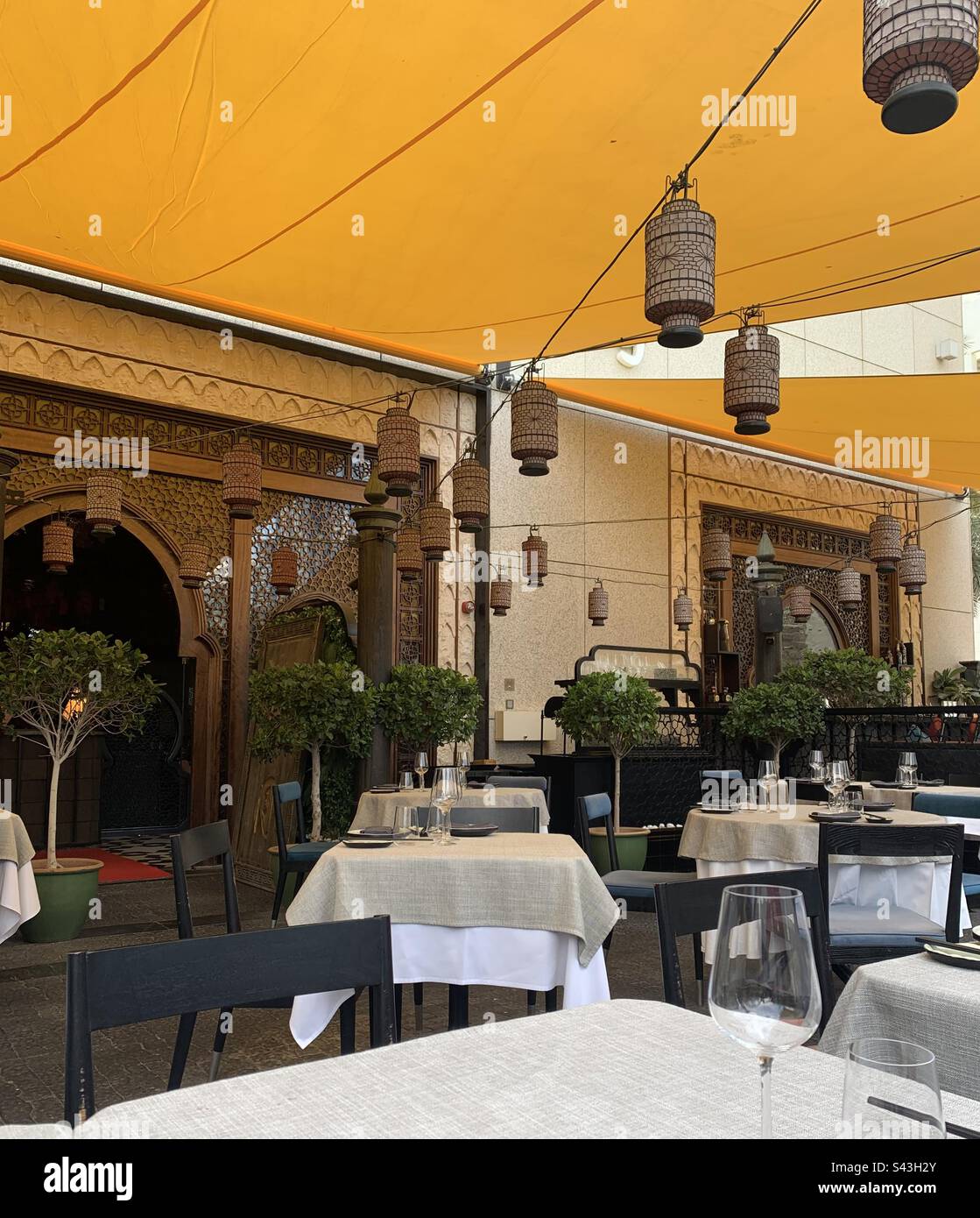 Outdoor terrace of an Asian restaurant in Dubai, UAE - Smartphone Captured Stock Image