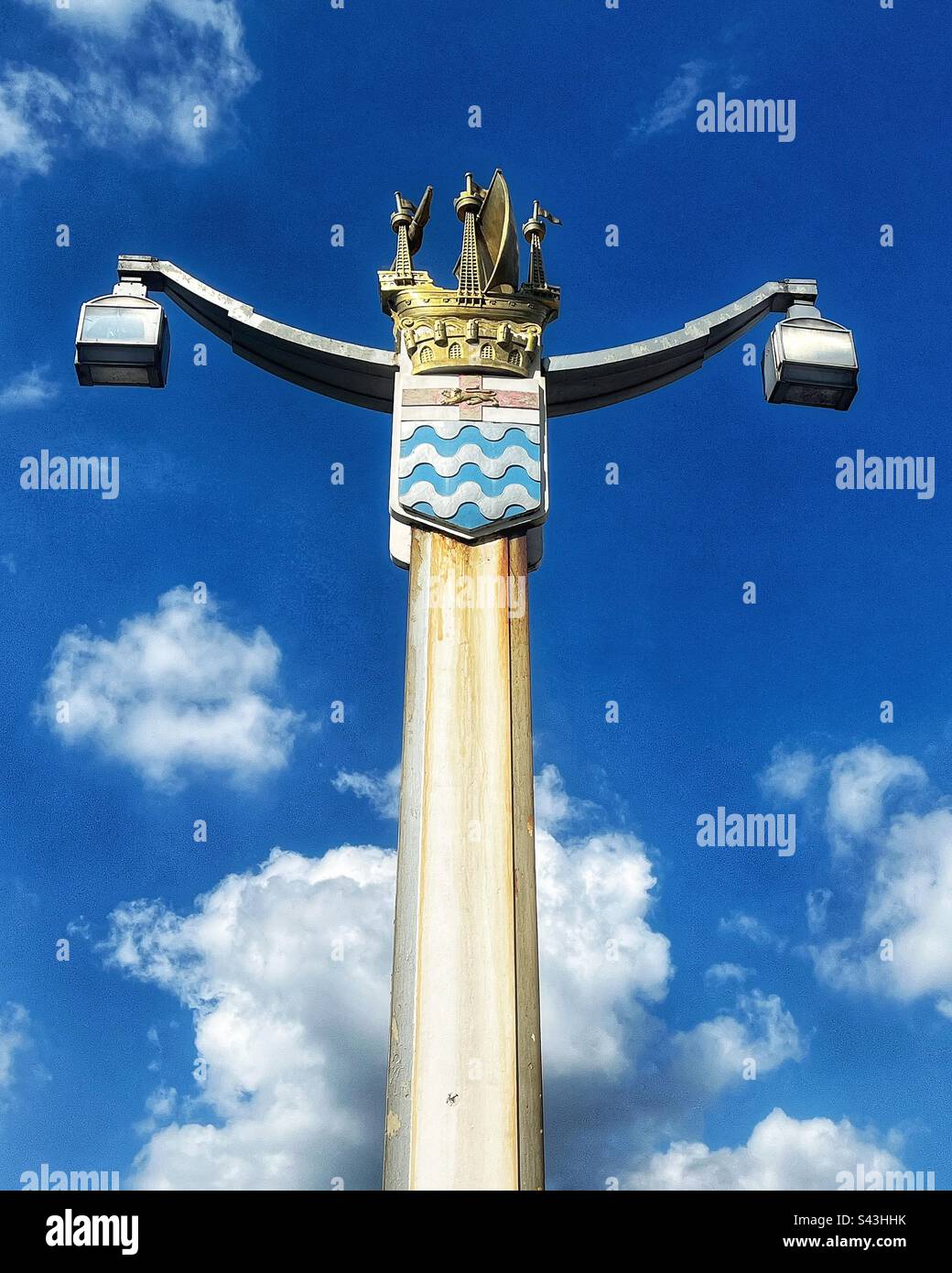 The coat of arms of the London County Council 1889 to 1965, on a lamppost at Chelsea Bridge across the river Thames - Smartphone Captured Stock Image