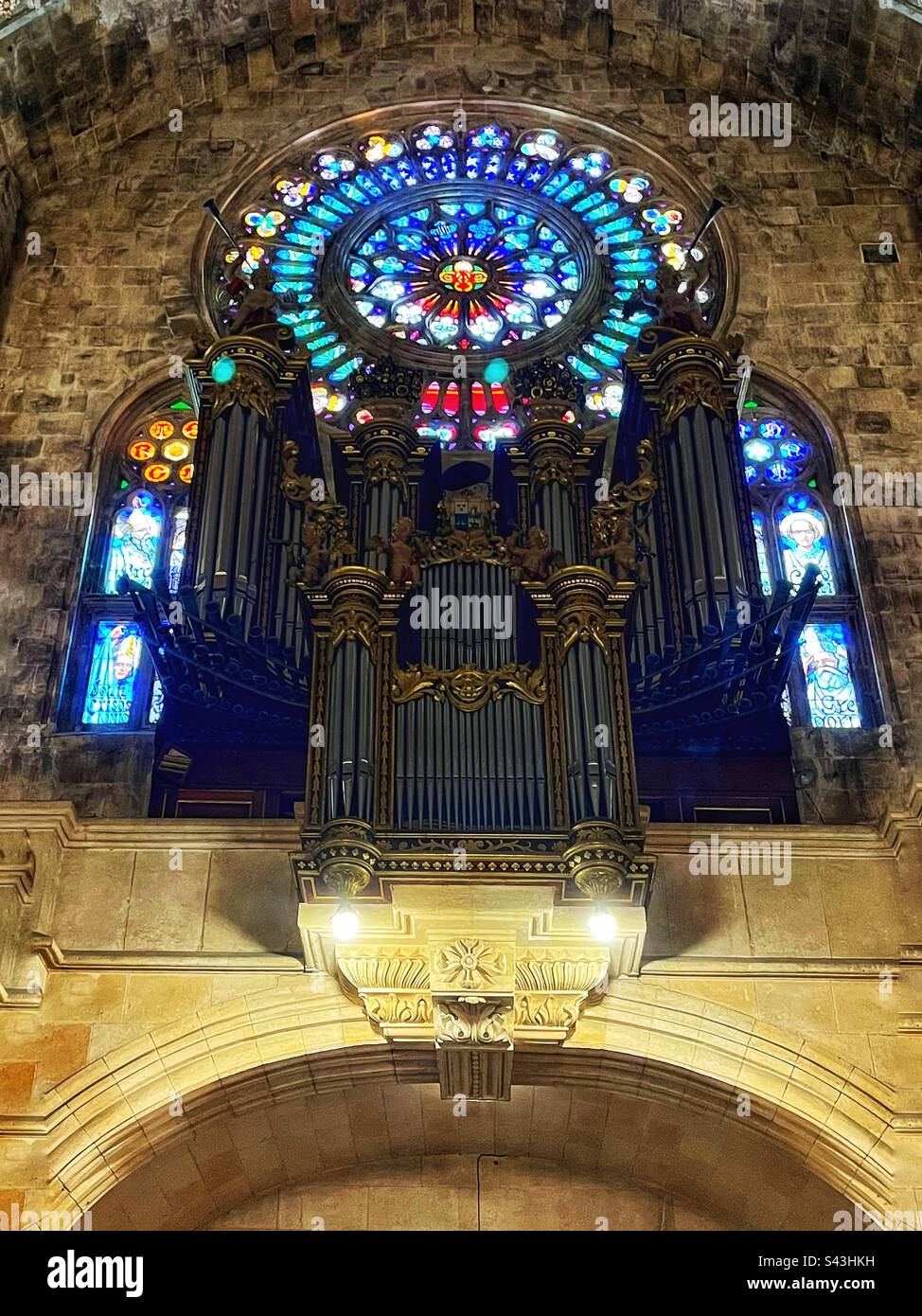 Església de Sant Bartomeu, Soller, Mallorca interior with organ and rose window. Originally 13th century this Roman Catholic Church now with Gothic, Baroque and Art Nouveau styles. Stock Photo
