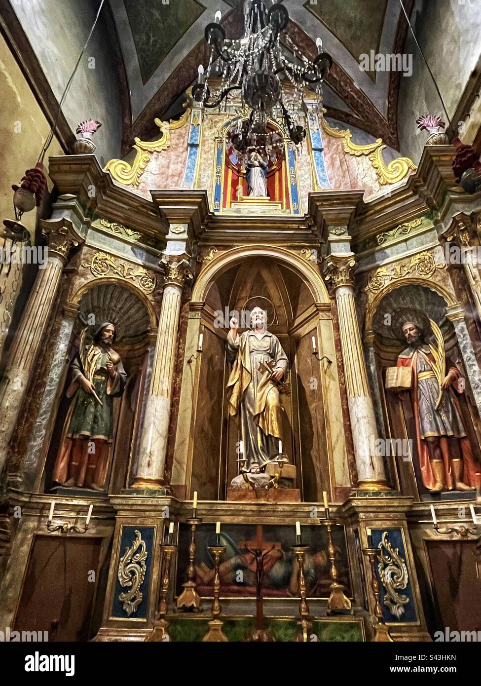 One of the many chapels in Església de Sant Bartomeu, Soller, Mallorca. This dedicated to St Peter or San Pere, the patron saint of fishermen. Stock Photo