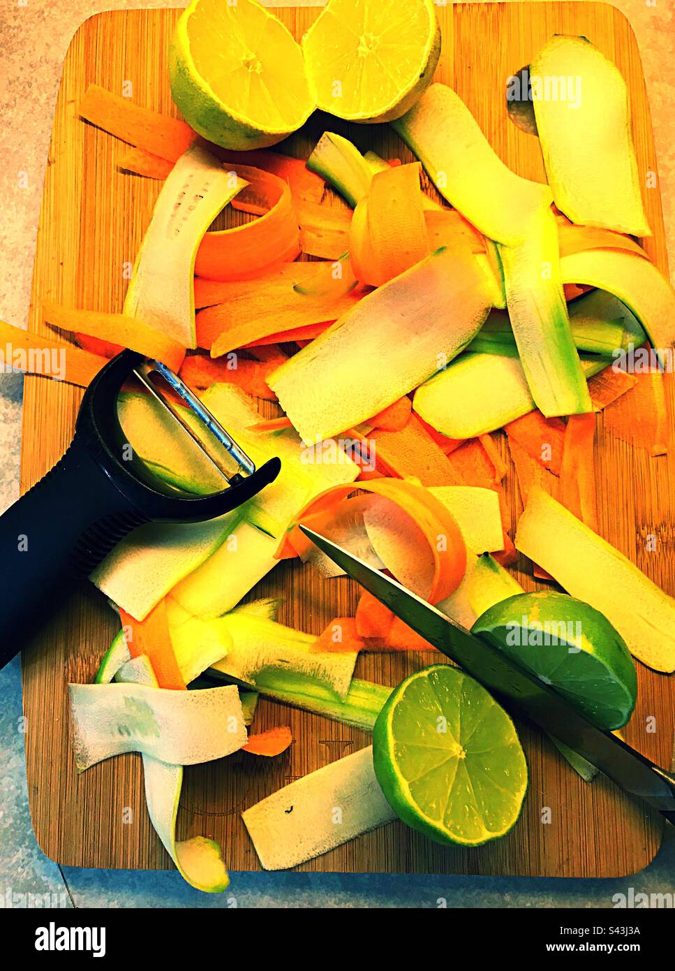 Getting the vegetables ribboned for a stir fry. Limes will be a lovely
