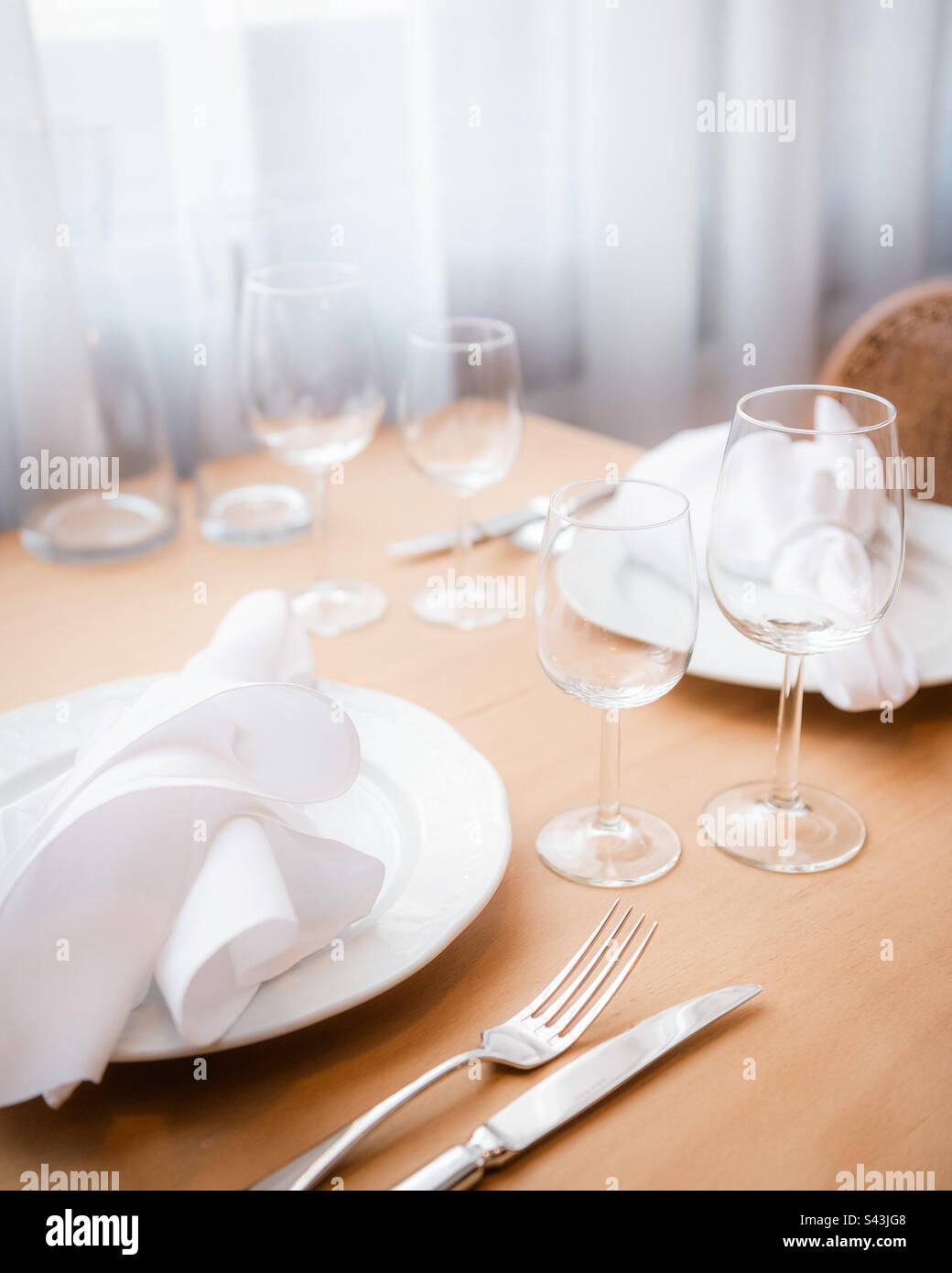 Simple but elegant table is set for two - Smartphone Captured Stock Image
