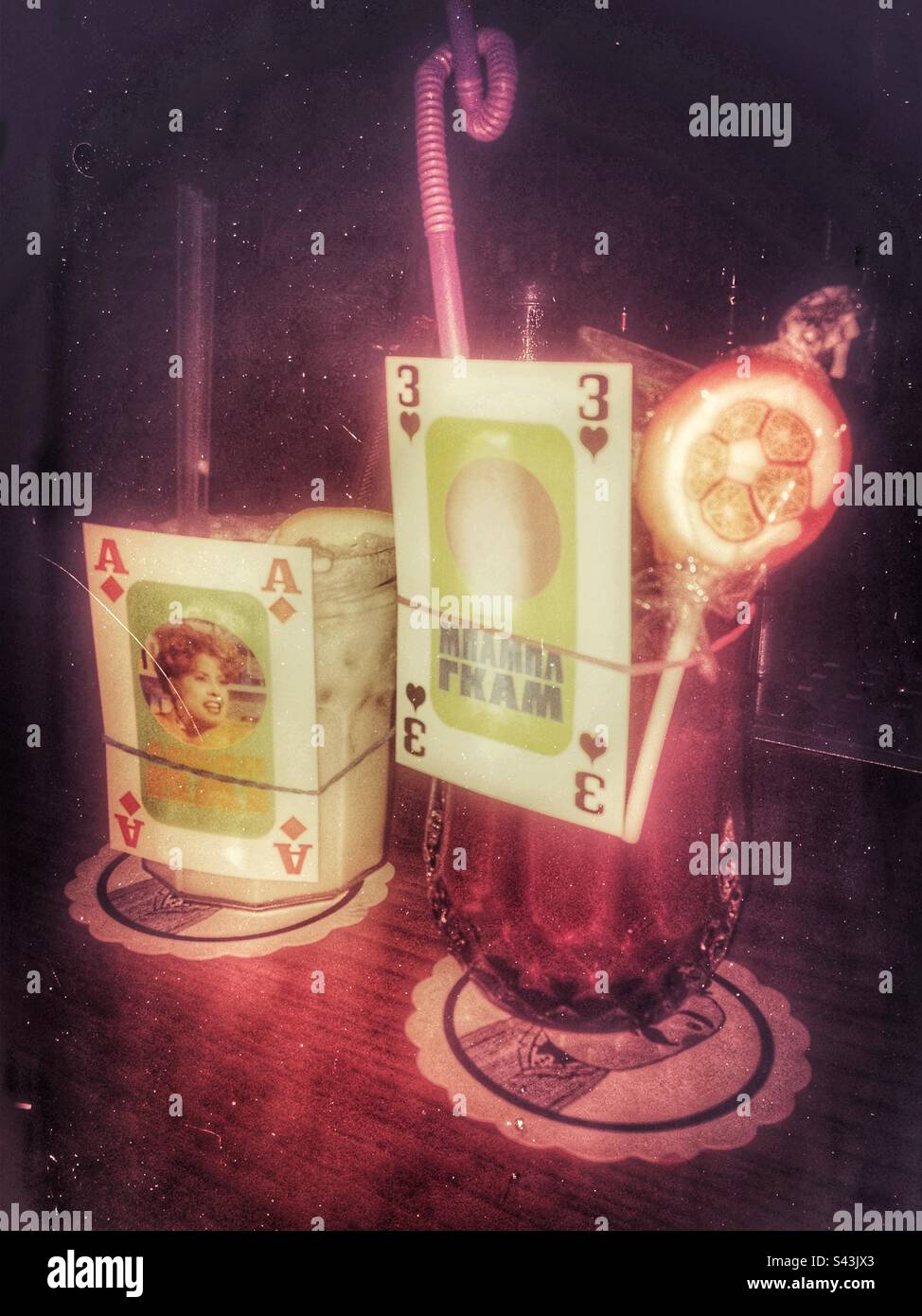 Bubblegum cocktail with orange lolipop - Smartphone Captured Stock Image