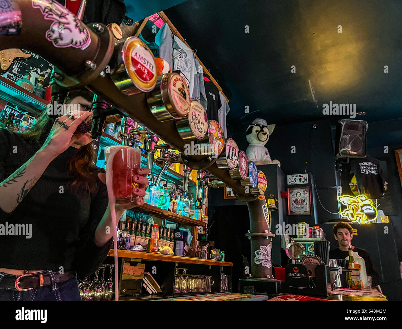 Pouring lager inside Santiago bar in Leeds City Centre - Smartphone Captured Stock Image