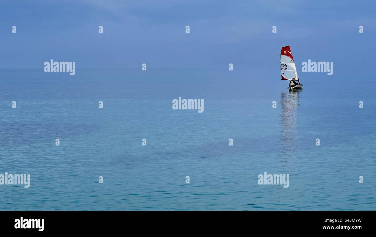 Small sailboat off Nago, Okinawa, Japan Stock Photo Alamy