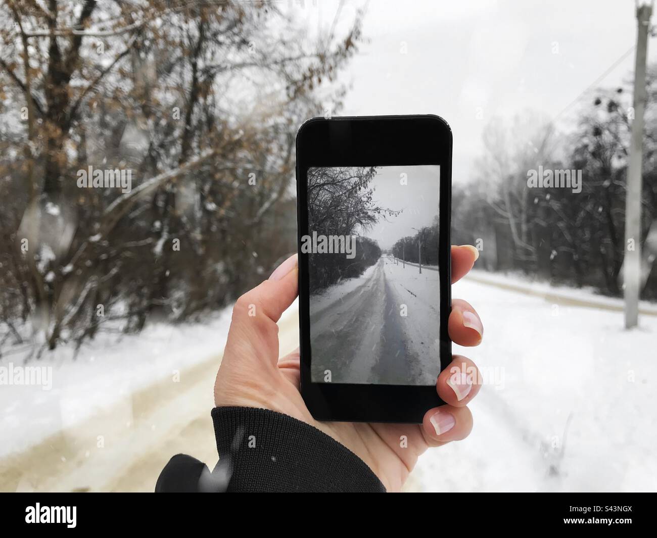 Winter road photo taking - Smartphone Captured Stock Image