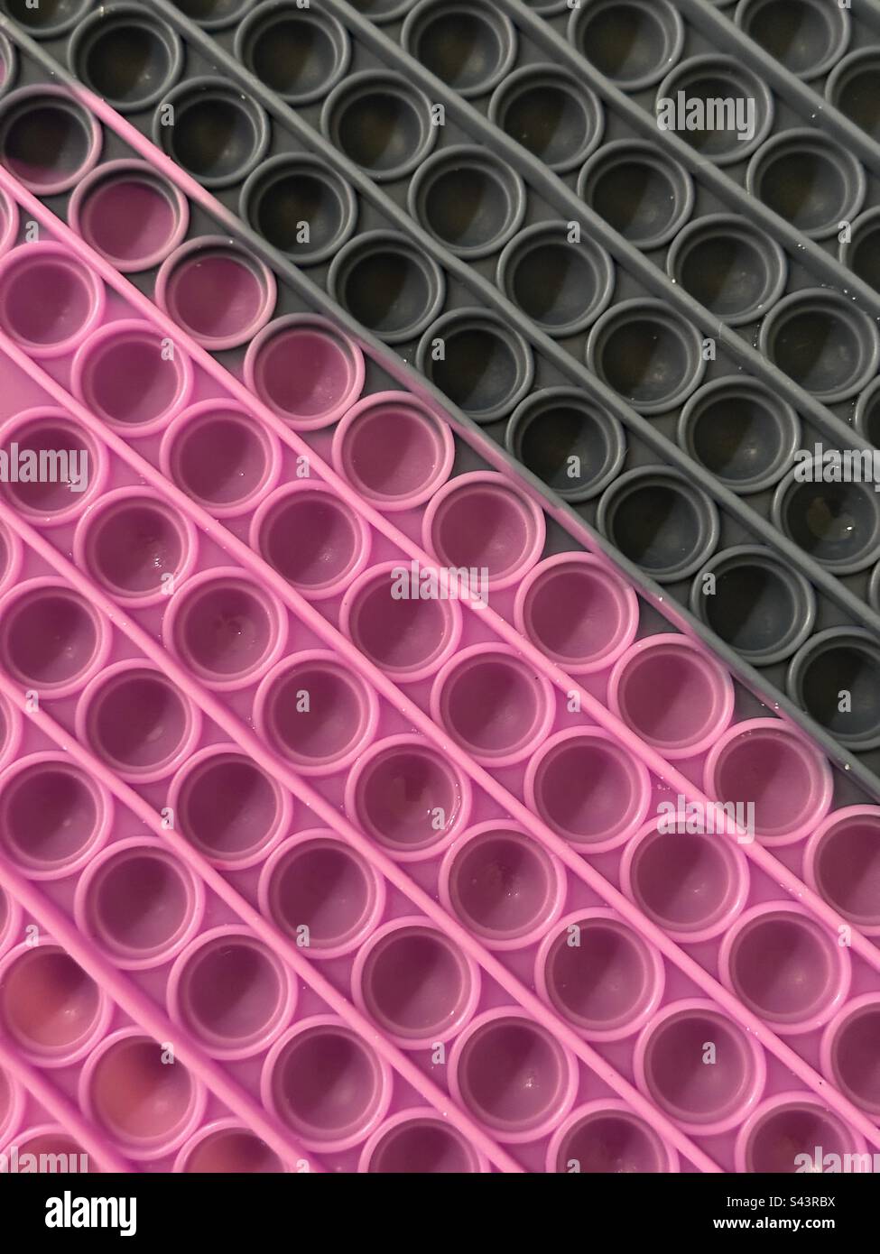 Abstract background pink and black circles and lines - Smartphone Captured Stock Image