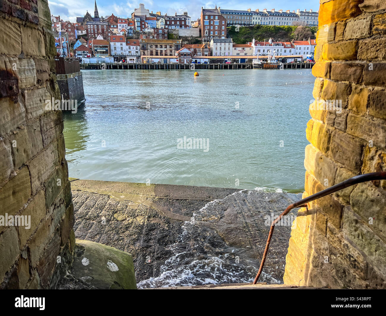 View of River Esk in Whitby from snicket off church street - Smartphone Captured Stock Image