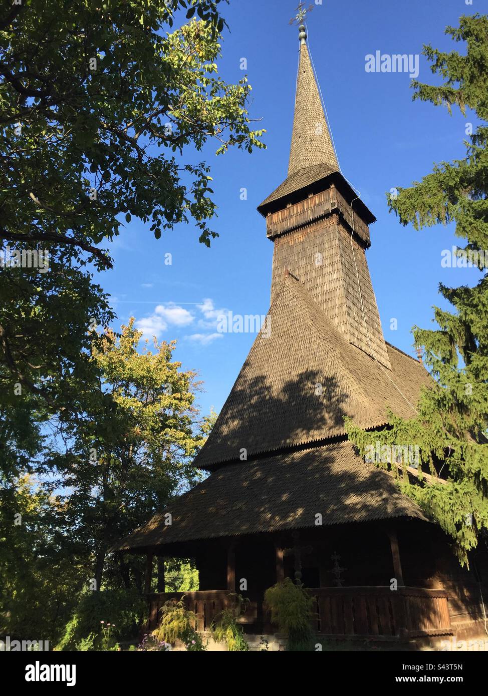 King Michael I Park, Bucharest, Romania. Traditional homes, churches and other constructions brought together from across Romania’s different regions. - Smartphone Captured Stock Image