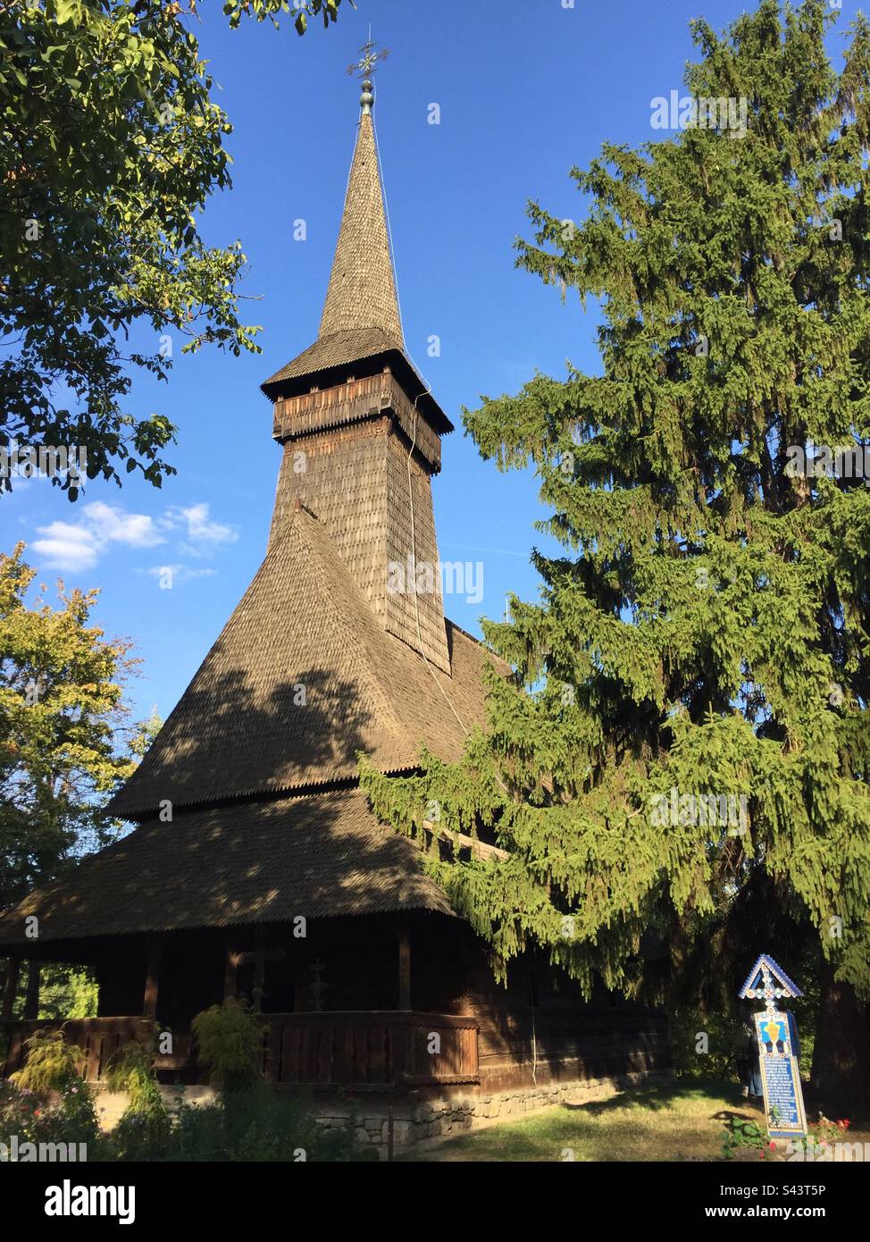King Michael I Park, Bucharest, Romania. Traditional homes, churches and other constructions brought together from across Romania’s different regions. - Smartphone Captured Stock Image