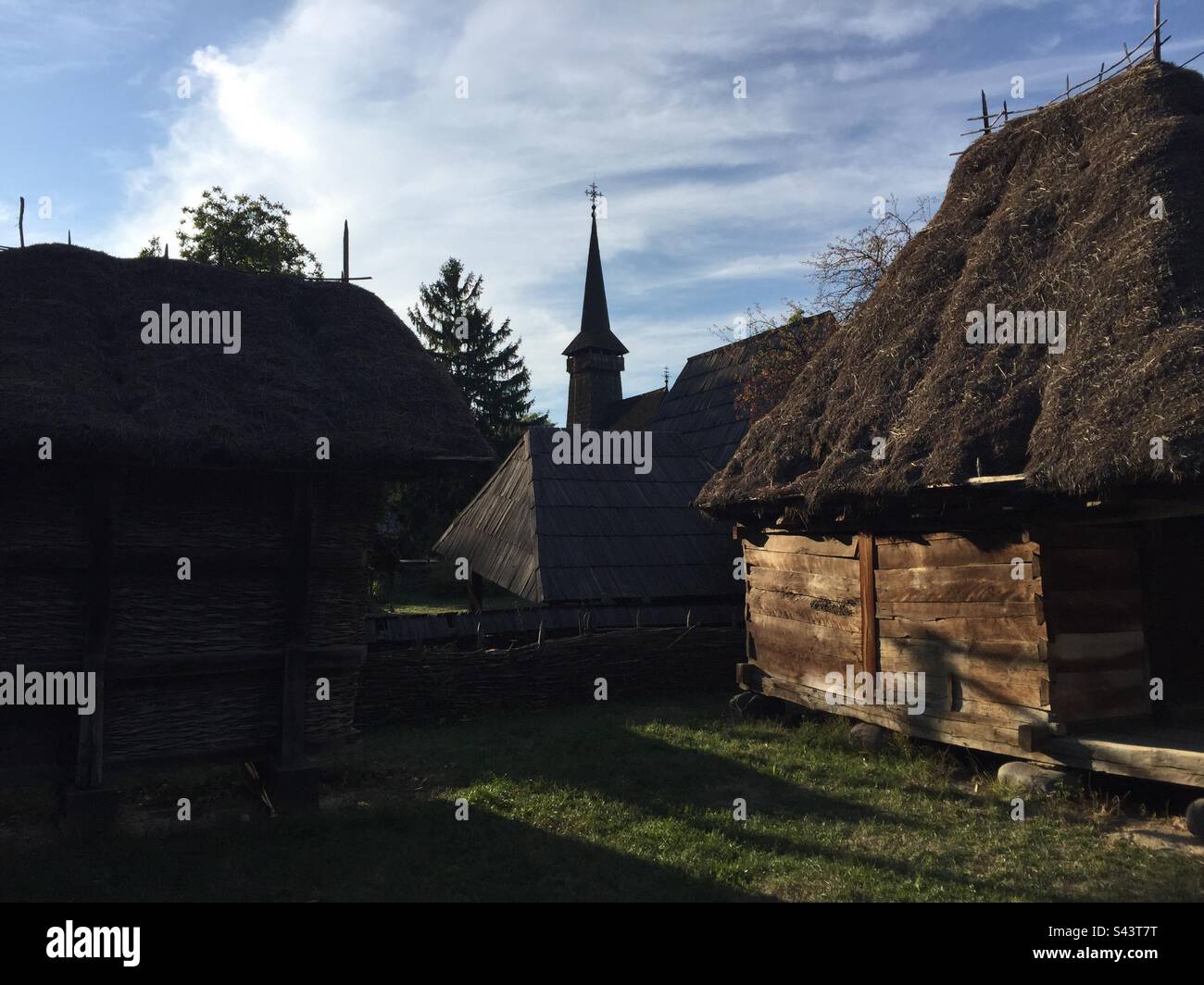King Michael I Park, Bucharest, Romania. Traditional homes, churches and other constructions brought together from across Romania’s different regions. - Smartphone Captured Stock Image
