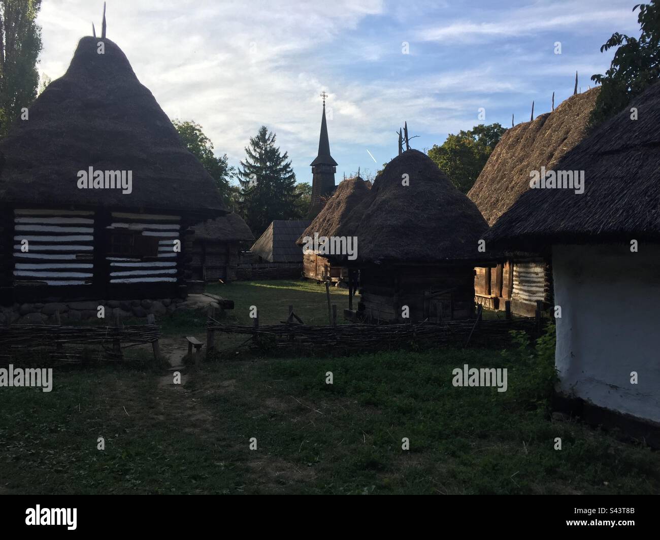 King Michael I Park, Bucharest, Romania. Traditional homes, churches and other constructions brought together from across Romania’s different regions. - Smartphone Captured Stock Image