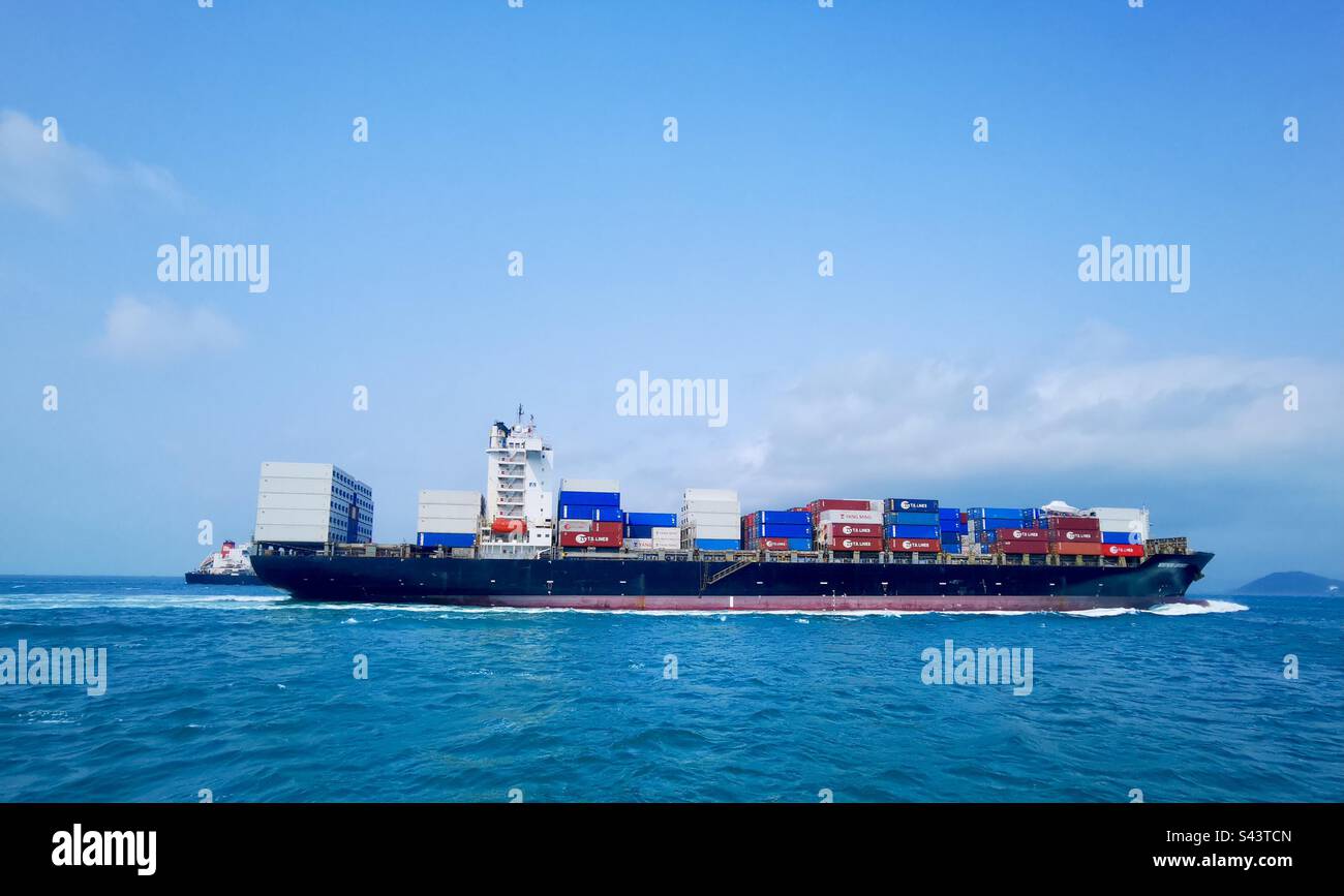 The Northern Defender container ship heading to the port of Hong Kong. - Smartphone Captured Stock Image