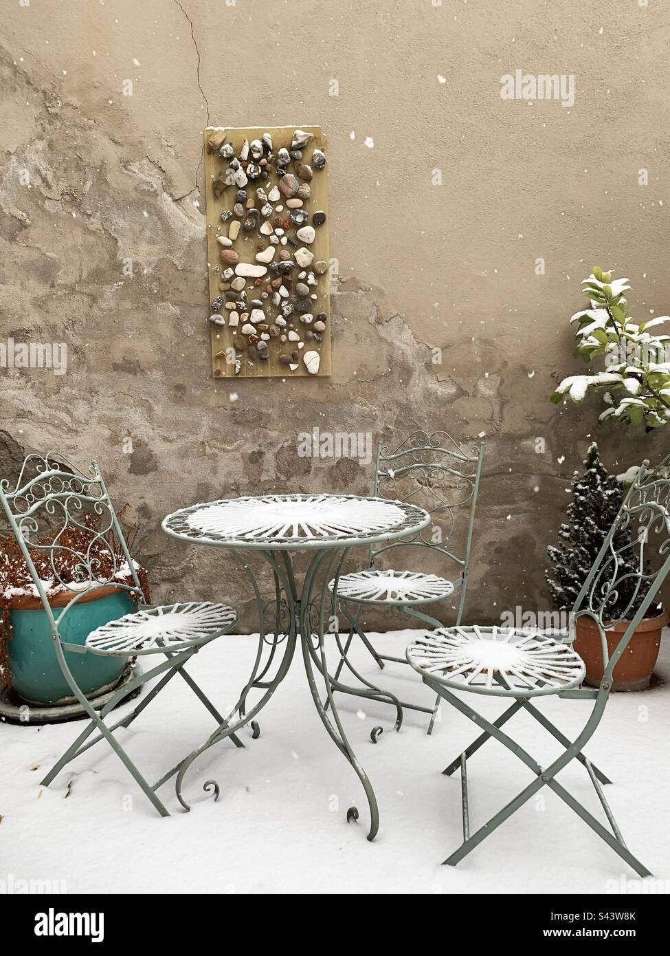Outdoor table and chairs under the snow - Smartphone Captured Stock Image