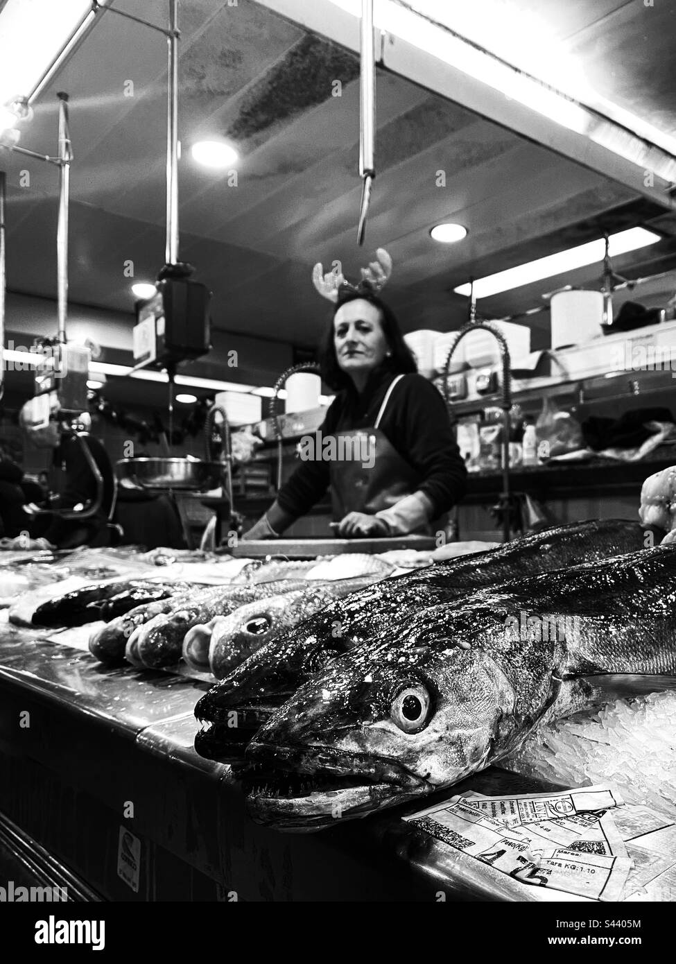 The fishwife and her fish in a fresh fish market Stock Photo Alamy