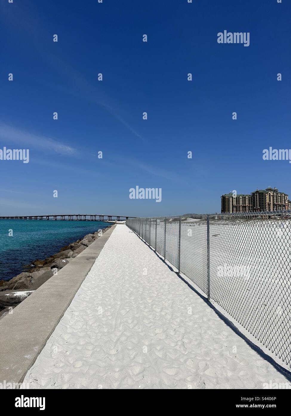 Development fencing at Norriego Point Beach Destin Florida East jetties - Smartphone Captured Stock Image