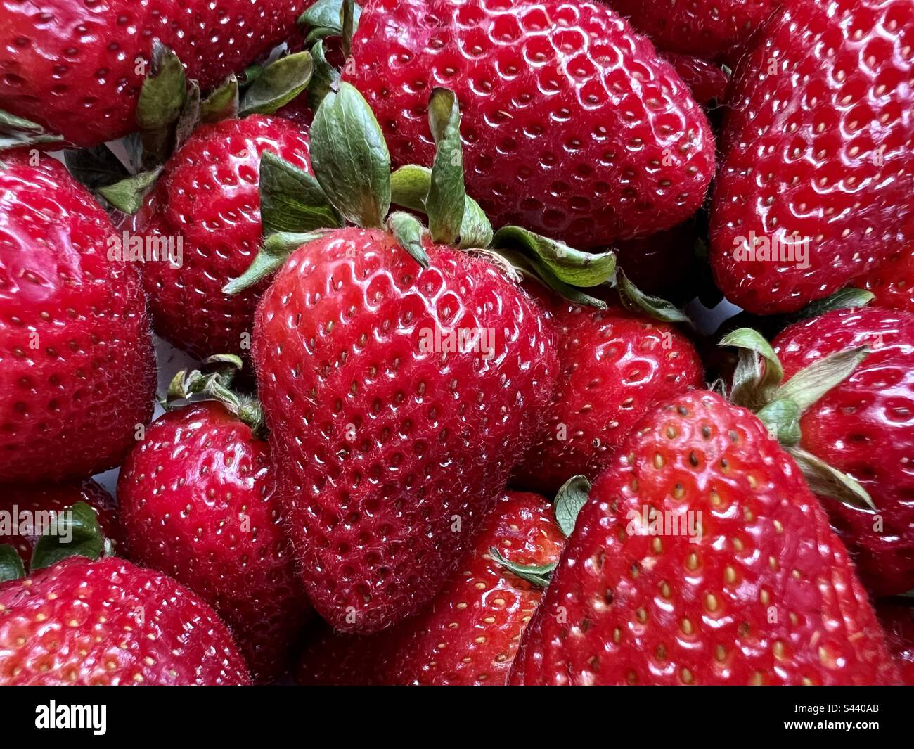 Wallpaper of strawberries hi-res stock photography and images - Alamy