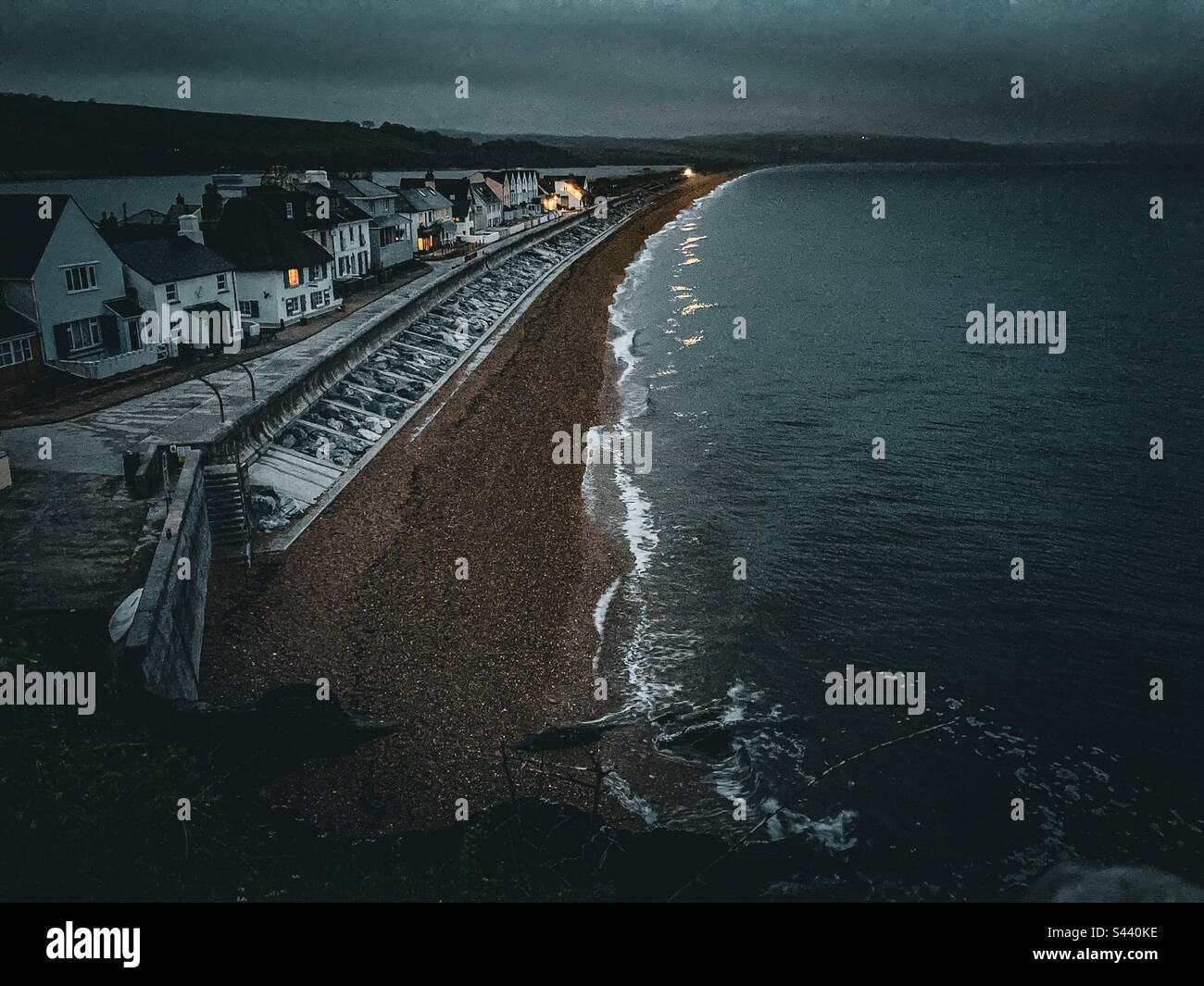 Sun setting at Torcross, Devon - Smartphone Captured Stock Image