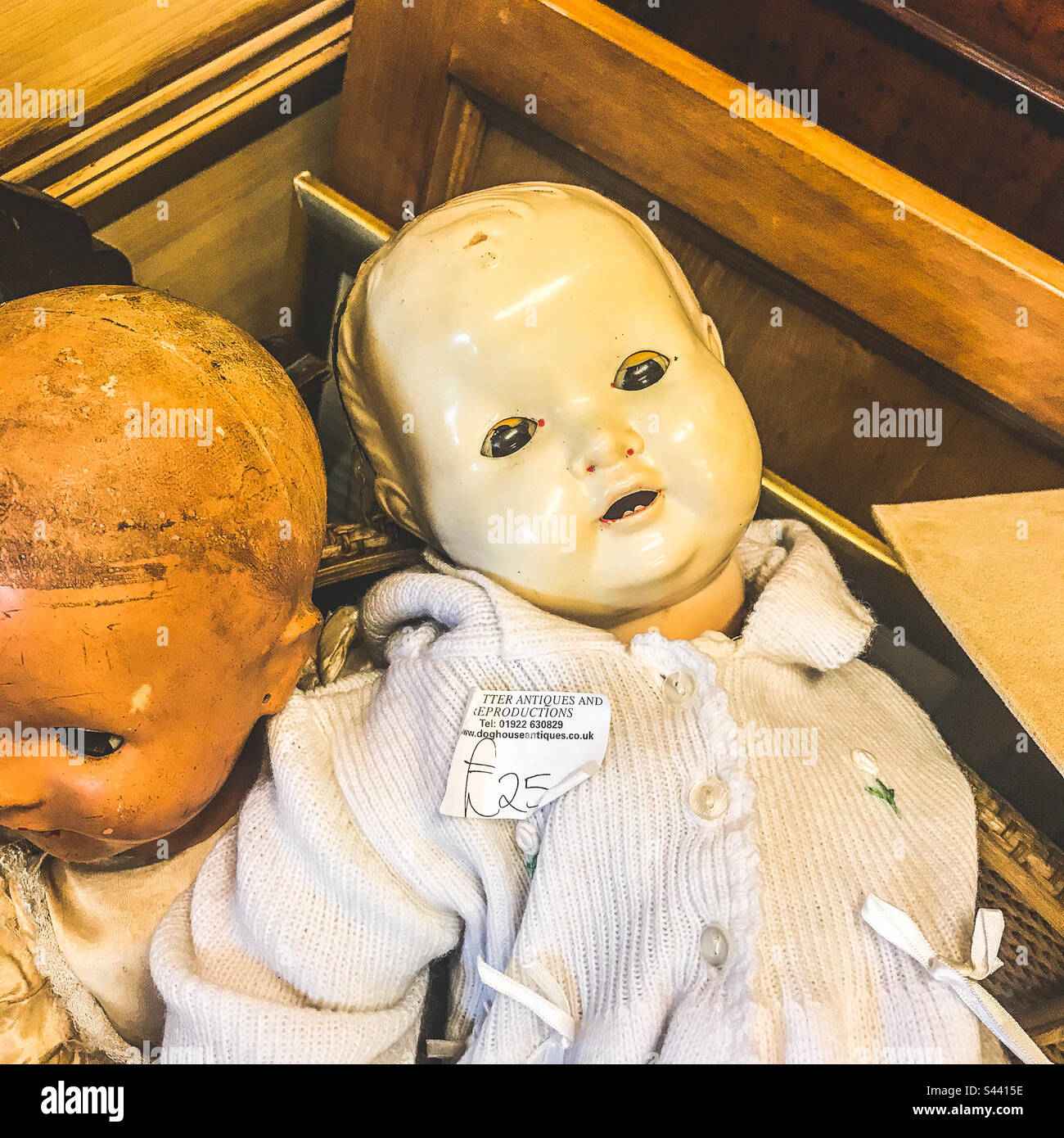 Junk shop creepy doll - Smartphone Captured Stock Image