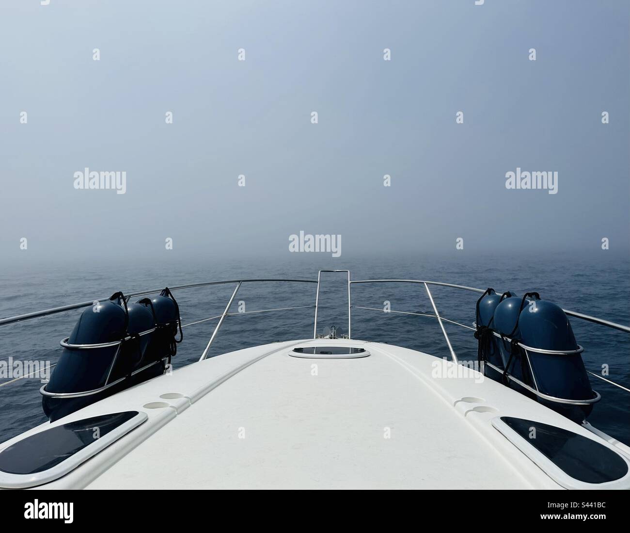 At sea on a motorboat in the fog - Smartphone Captured Stock Image