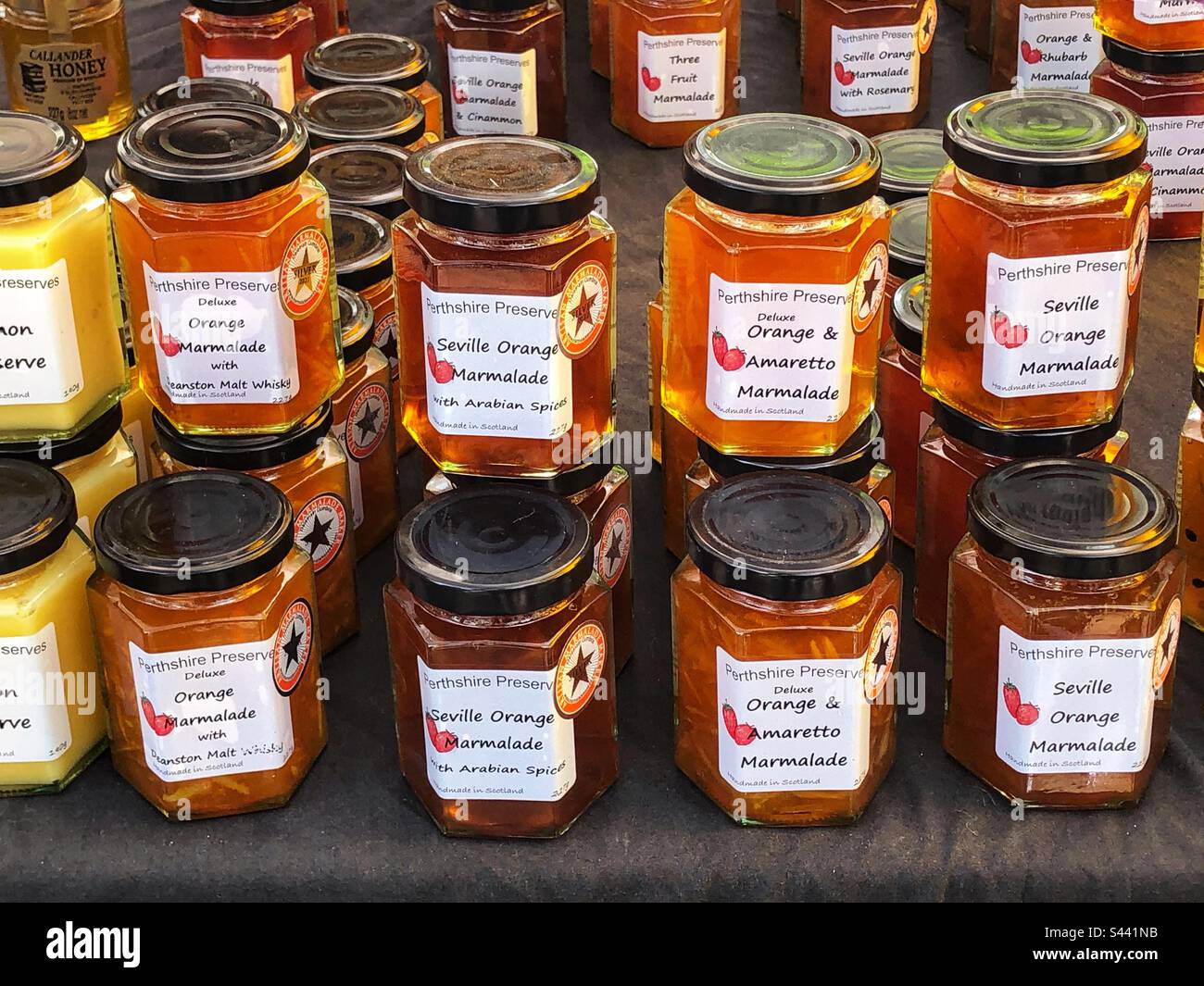 Speciality marmalades for sale at local farmers market stall Stock