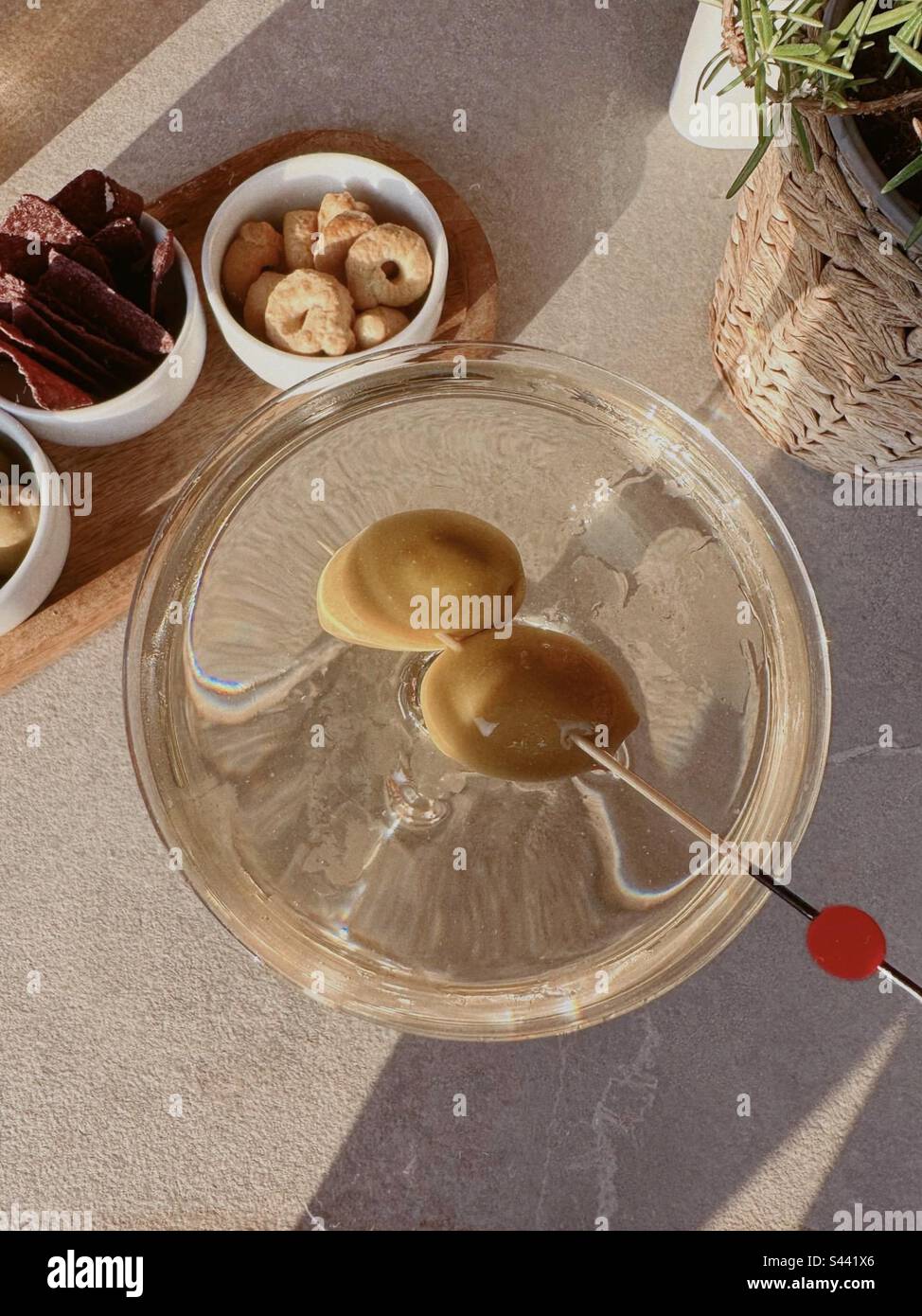 Dirty martini in sunshine Stock Photo